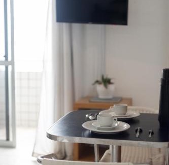 Ponta do Farol Apartment | Inviting Flat Near Beach with Scenic Views and Great Amenities