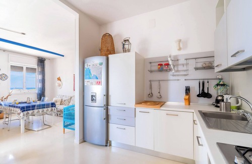 Porto Cesareo Apartment | Colus Apartment: Steps from the Sea with Oceanfront Views