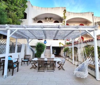 Falerna House | Experience VISTA MARE: Oceanfront Retreat with Garden Oasis
