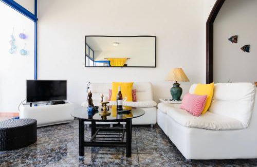 Caleta de Caballo House | Elegant Vista Mejía 1: Cozy Fireplace & 4-Star Comfort