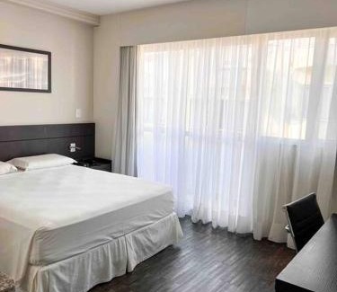Sao Luiz Apartment | Comfortable Apartments in Belo Horizonte with Pool Access