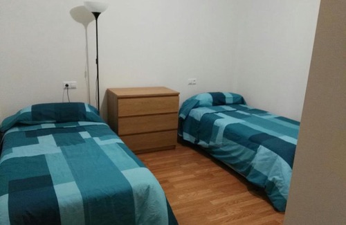 Burela Apartment | Panoramic Views and Family-Friendly Amenities Await You