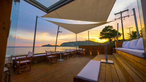 Agios Georgios Pagon Apartment | Beachfront Vistonia: 4-Star Ocean View Getaway