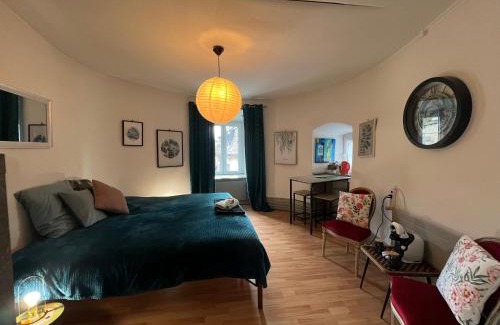 Porrentruy Apartment | Experience a Fairytale in a Medieval Round Tower Room