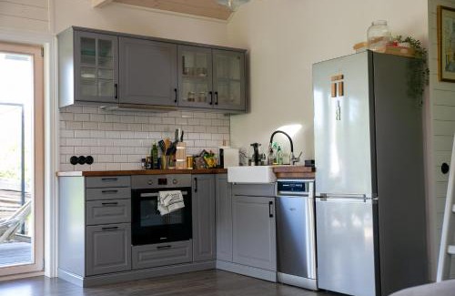 Pieriga House | Discover Vizbules: Family and Pet-Friendly Getaway