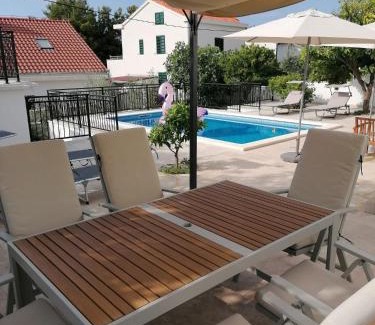 Seget Vranjica Villa | VLATINO: Oceanfront Retreat with 9.8 Guest Rating