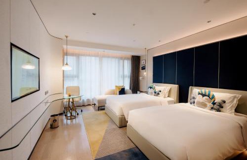 Weiyang Hotel | Discover voco Xian ETDZ: A 5-Star Family Retreat