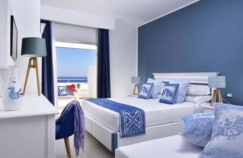 Golfo Aranci Hotel | Experience VOI Colonna Village: Poolside Ocean Views