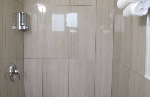 Listowel Hotel | Discover Magnuson Hotel Vow: Eco-Friendly Stay with Pool