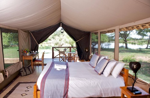 Taveta Cabin | Experience Voyager Ziwani Tented Camp: Guest Rated 9.8!