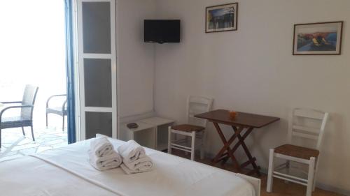 Kionia Apartment | Oceanfront Vrahos Studios: Guest Rated 9/10 for Families