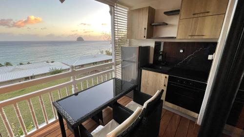 Le Diamant Apartment | Seaside Escape at Vue Mer & Rocher - Okavango Blue Studio