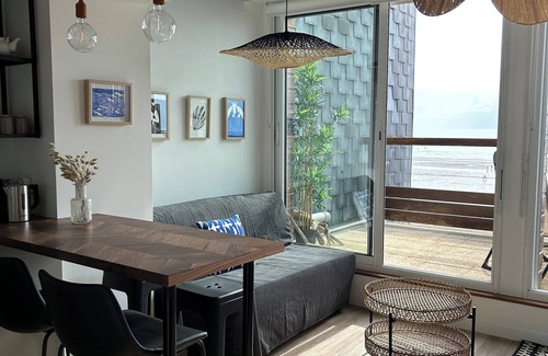 Agon-Coutainville Apartment | Ocean View Retreat: Renovated Apartment in Seaside Paradise