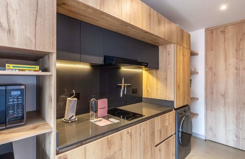 Zona Rosa Apartment | Cozy Loft with Balcony - Pet & Child Friendly Retreat