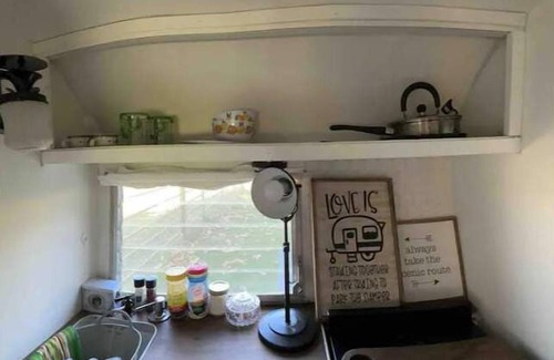 Sanger House | Rustic Wagon Wheel Ranch Cowboy Camper for Family Adventures
