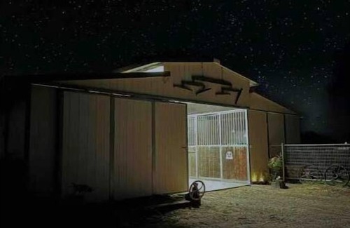 Sanger House | Rustic Wagon Wheel Ranch Cowboy Camper for Family Adventures