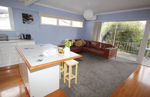 Waiwera House | Waiwera Beach Getaway: Pet-Friendly Retreat with Spa Access