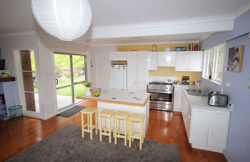 Waiwera House | Waiwera Beach Getaway: Pet-Friendly Retreat with Spa Access