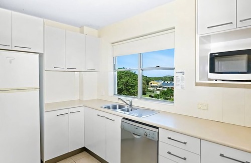 Coffs Harbour Apartment | Experience Ocean Breezes Near Park Beach with Great Amenities
