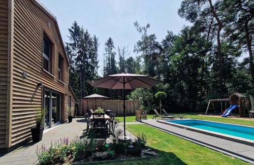 Region Hannover District House | Waldhaus Tiedtke: Oceanfront Retreat with Pool Access