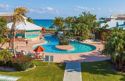 Williams Town Resort | Relax by the Archipelago: Poolside Retreat Awaits You