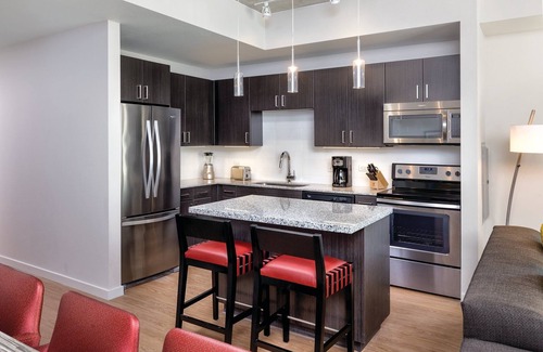 Civic District Resort | Prime Location: Walk to Hot Spots with Pool & Breakfast