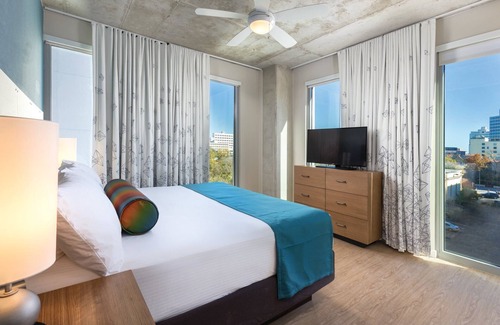 Civic District Resort | Prime Location: Walk to Hot Spots with Pool & Breakfast