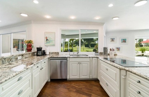 Moorings House | Seaside Retreat: Renovated Home with Pool & Golf Views