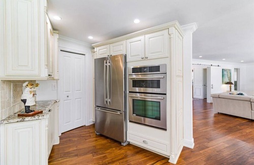 Moorings House | Seaside Retreat: Renovated Home with Pool & Golf Views