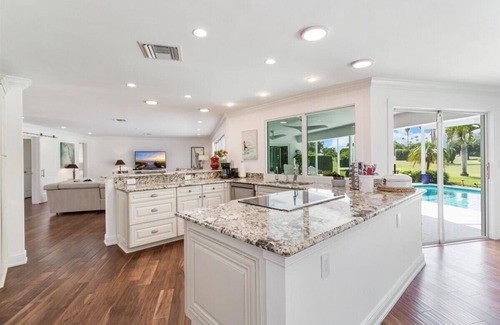 Moorings House | Seaside Retreat: Renovated Home with Pool & Golf Views