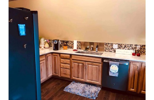 Williamsburg House | Experience Elk Rapids Charm: Steps from Traverse & Charlevoix