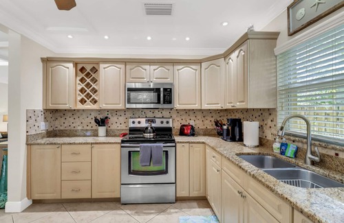 Naples Park House | Ideal Getaway: Walk to Vanderbilt Beach with Private Pool