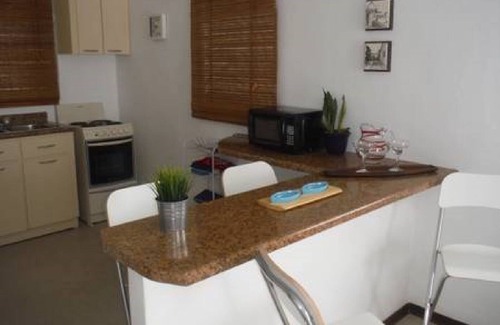 Puerta de Tierra Apartment | Value-Driven Walk-up PH: 2 BR, Private Terrace & Ocean Views