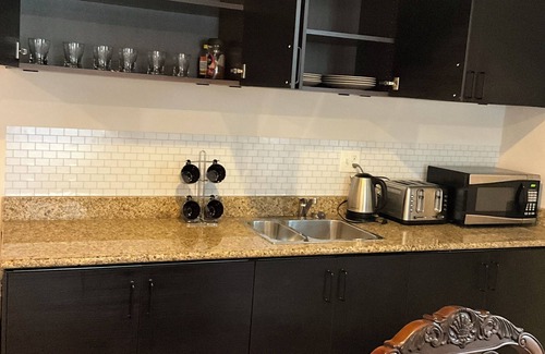 Triangle House | Bright & Inviting 2-Bedroom Basement with Modern Amenities