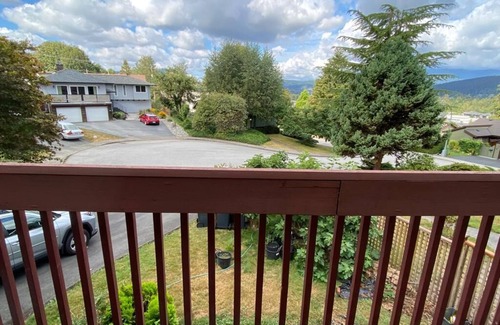Port Moody House | Bright Upper Floor House Steps from Skytrain with Pool