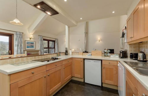 Slate Islands Cottage | Walled Garden Mews 5: Family-Friendly Cottage with Pool