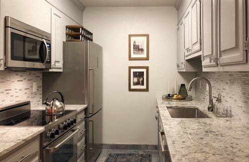 Whittier House | Serene Walnut Mews: Creekside Townhome by Pearl Street