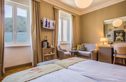 Lugano City-Centre Hotel | Relax at Walter au Lac: Spa, Breakfast & Family-Friendly!