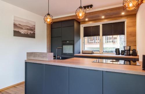 Turracher Hohe House | Escape to Wanderlust Mountain Chalet: Spa & Family-Friendly