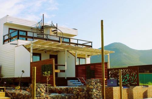 Guanaqueros Apartment | Discover Wannaqueros Suites: Pet Friendly & Poolside Bliss