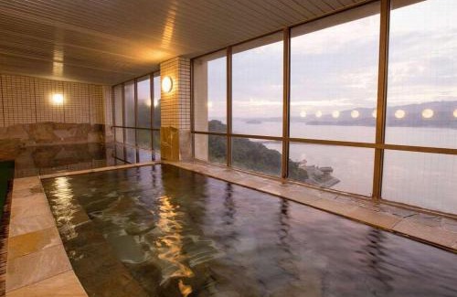 Nishiuracho Hotel | Relax at Wano Resort Hazu with Hot Tub & Easy Access