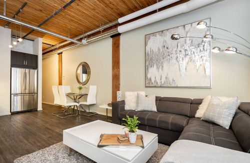 Exchange District Condo | Prime Warehouse Loft in Exchange District with Pool & Parking