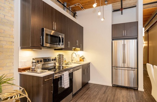 Exchange District Condo | Prime Warehouse Loft in Exchange District with Pool & Parking
