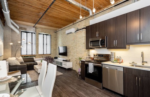 Exchange District Condo | Prime Warehouse Loft in Exchange District with Pool & Parking