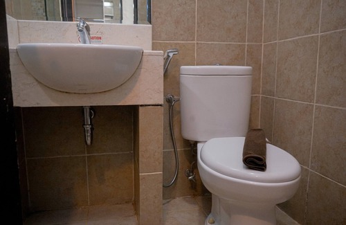 Panunggangan Utara Apartment | Warm and Minimalist Studio (No Kitchen) at Great Western Apartment