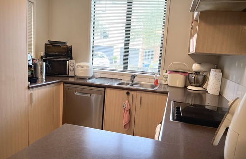 Glen Eden House | Cozy Retreat: Fully Furnished Home in Prime Location