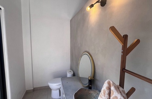Troncones Bed & Breakfast | Warm room with the sea in the background and starry skies.