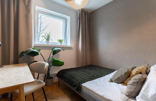 Praga Poludnie Apartment | Explore Warsaw Concierge Kinowa Gardens - Family-Friendly Stay
