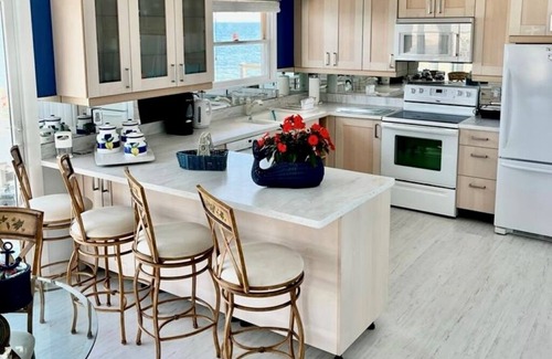 Greenport House | Prime Waterfront Beach House with Private Beach Access