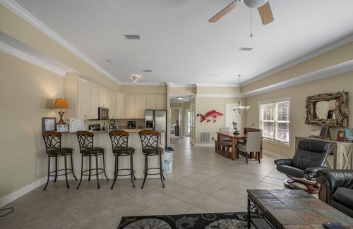 Orange Beach Villa | Seaside Retreat with Boat Dock & Unmatched 10/10 Guest Rating